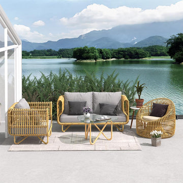 4 Pieces Rattan Outdoor Sofa Set with Glass Top Coffee Table and Cushions in Yellow